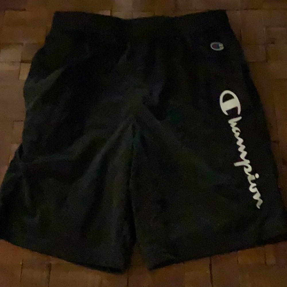 Boys champion shorts with side logo. Size:large. Colors: black and white.